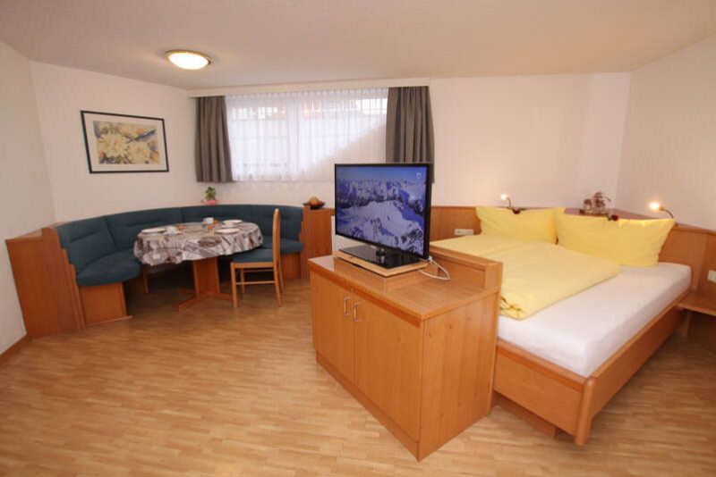  Sleeping-living area in apartment 1 in Apart Gruber